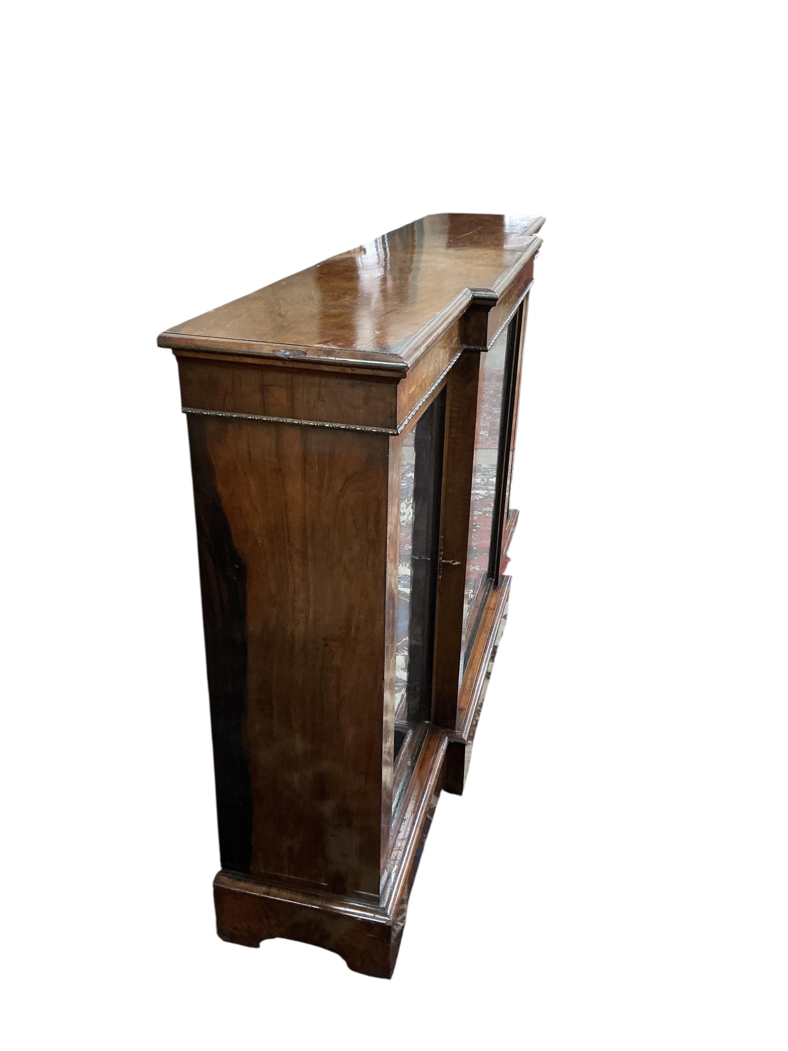 A Victorian gilt metal mounted inlaid walnut breakfront side cabinet, width 164cm, depth 36cm, height 104cm